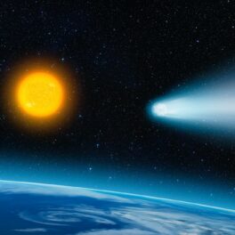 O cometă strălucitoare care se îndreaptă către Soae, cu Pământul în partea de jos. Bernardinelli-Bernstein, una dintre cele mai mari comete, se va apropia de Soare în 2031