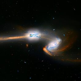 Imagine 3D cu o coliziune intre 2 galaxii, pe fundal negru. Vârtejul surprins deasupra Hawaii a fost, de fapt, cauzat de o rachetă SpaceX