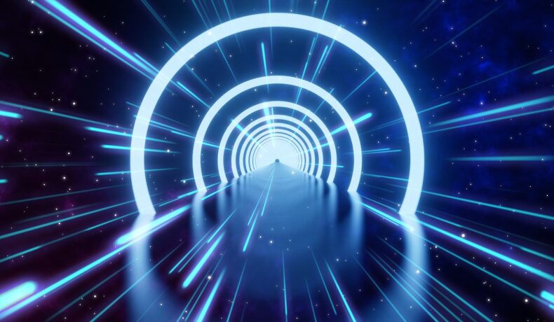 Tunel albastru pe negru, cu stele pe fundal, vedere similară cu ce s-ar întâmpla dacă un om s-ar mișca la viteza luminii