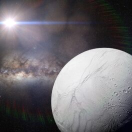 Imagine digitală cu Enceladus, ce are cele 6 elemente necesare vieții, pe fundal negru, cu o stea în colțul dreapta sus